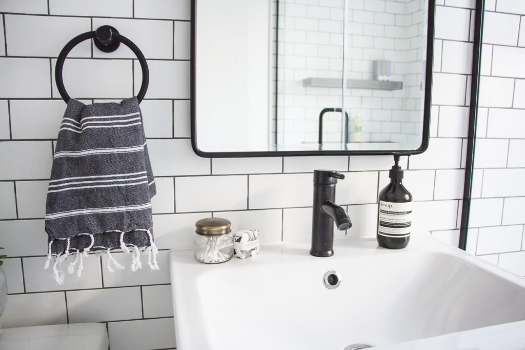 modern bathroom, black and white bathroom makeover, a bathroom with a modern mix