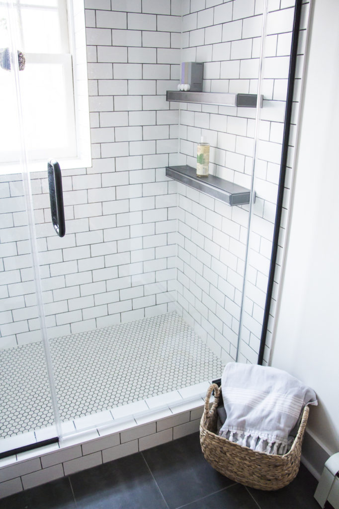 modern bathroom, black and white bathroom makeover, a bathroom with a modern mix