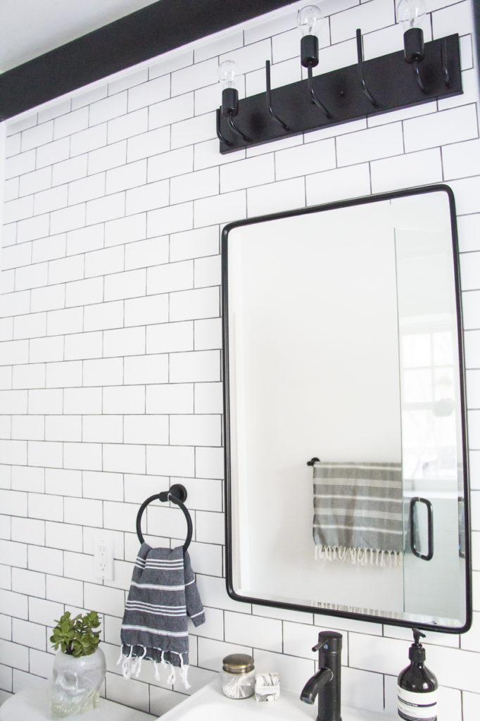 modern bathroom, black and white bathroom makeover, a bathroom with a modern mix