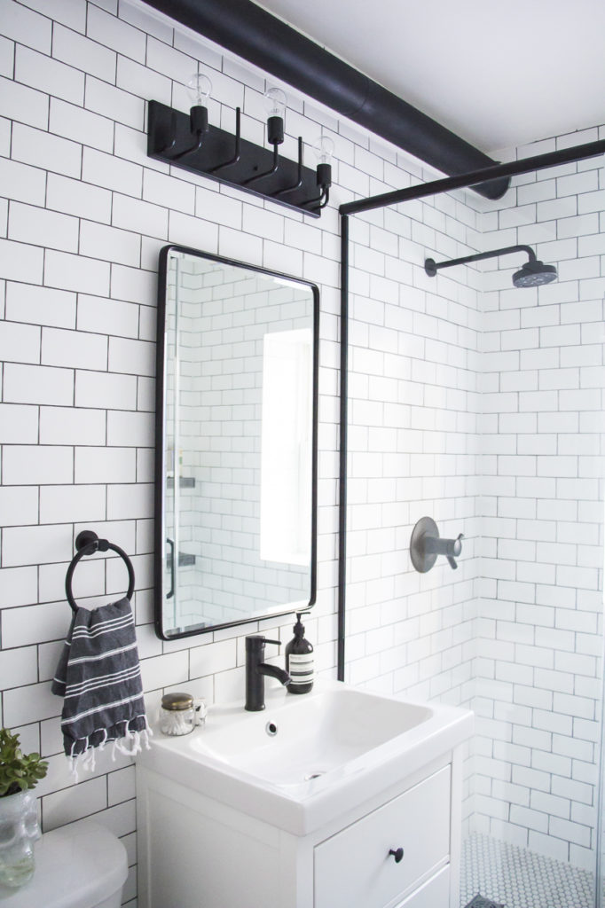 modern bathroom, black and white bathroom makeover, a bathroom with a modern mix