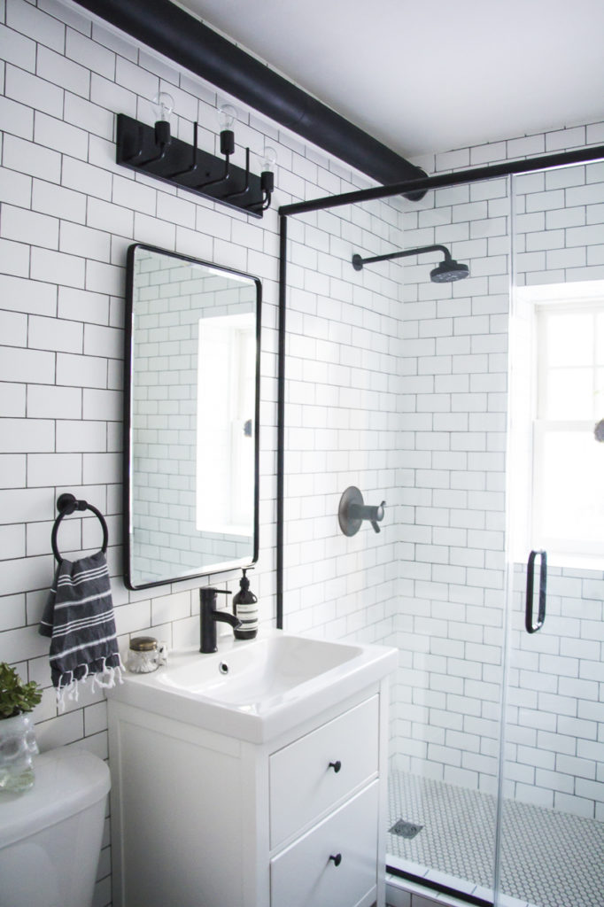 modern bathroom, black and white bathroom makeover, a bathroom with a modern mix