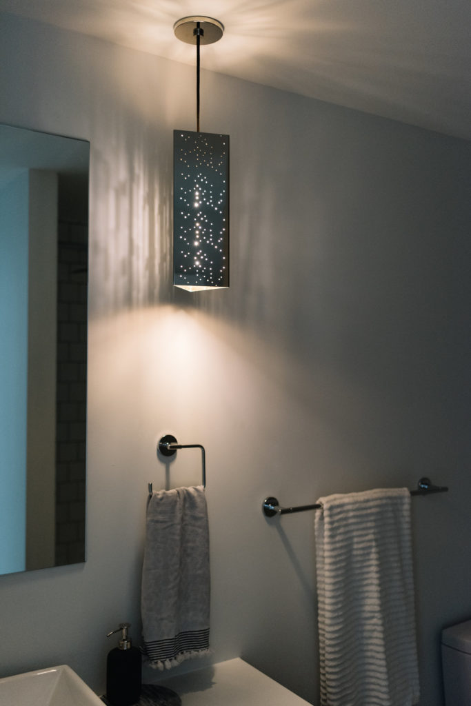 creating a whole house lighting design, single bathroom pendant