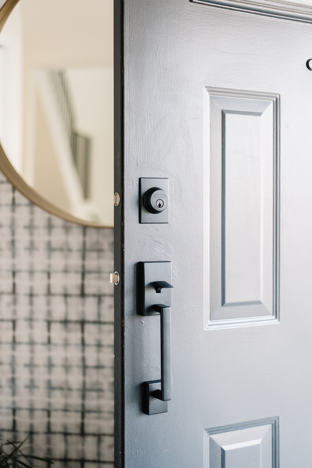 front entry, modern front entry design, front entry ideas, matte black doorknob, black door