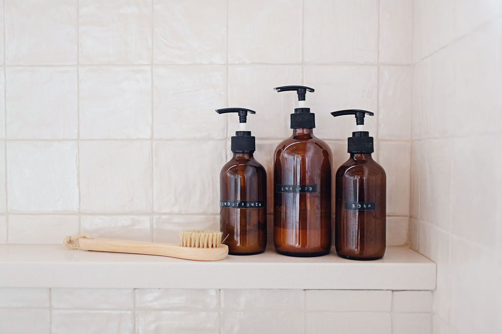 amber bottles, simple bathroom styling