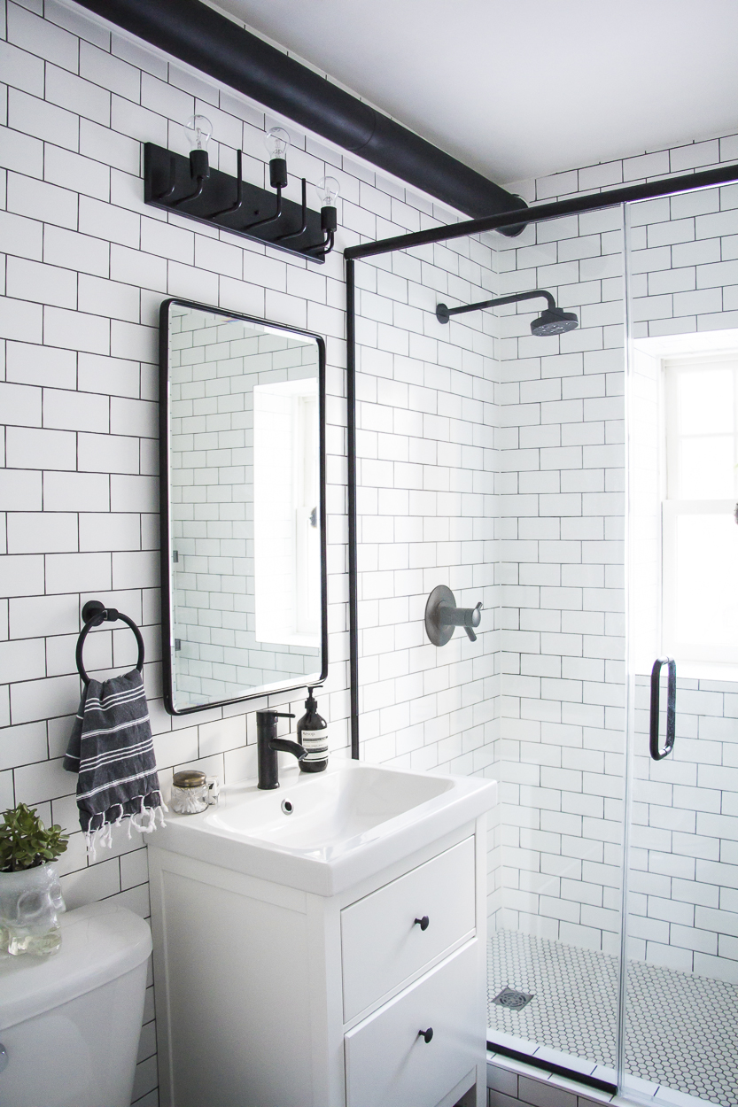 modern bathroom, black and white bathroom makeover, a bathroom with a modern mix